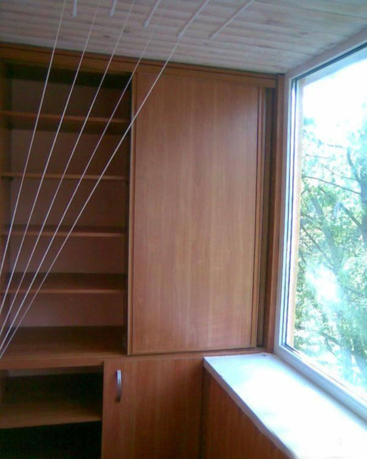 Шкафчики на балконе: 40 уютных идей для обустройства, фото № 27