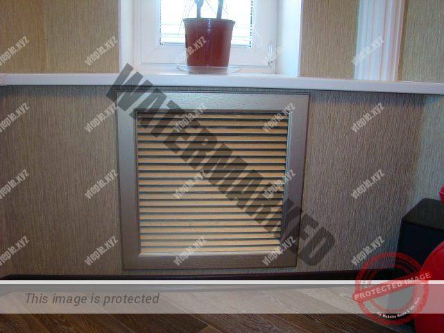 Декоративная решетка на радиаторе в нише под окном